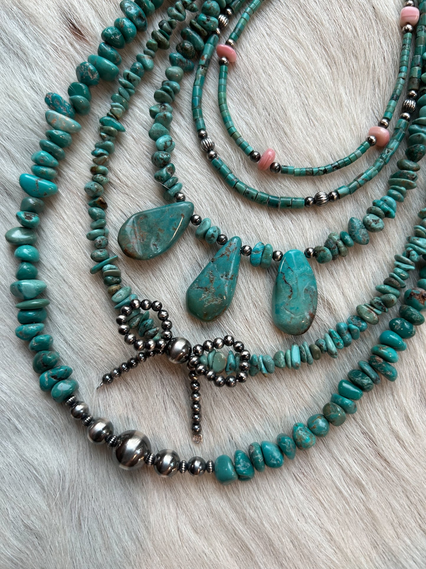 Turquoise with pearl bow