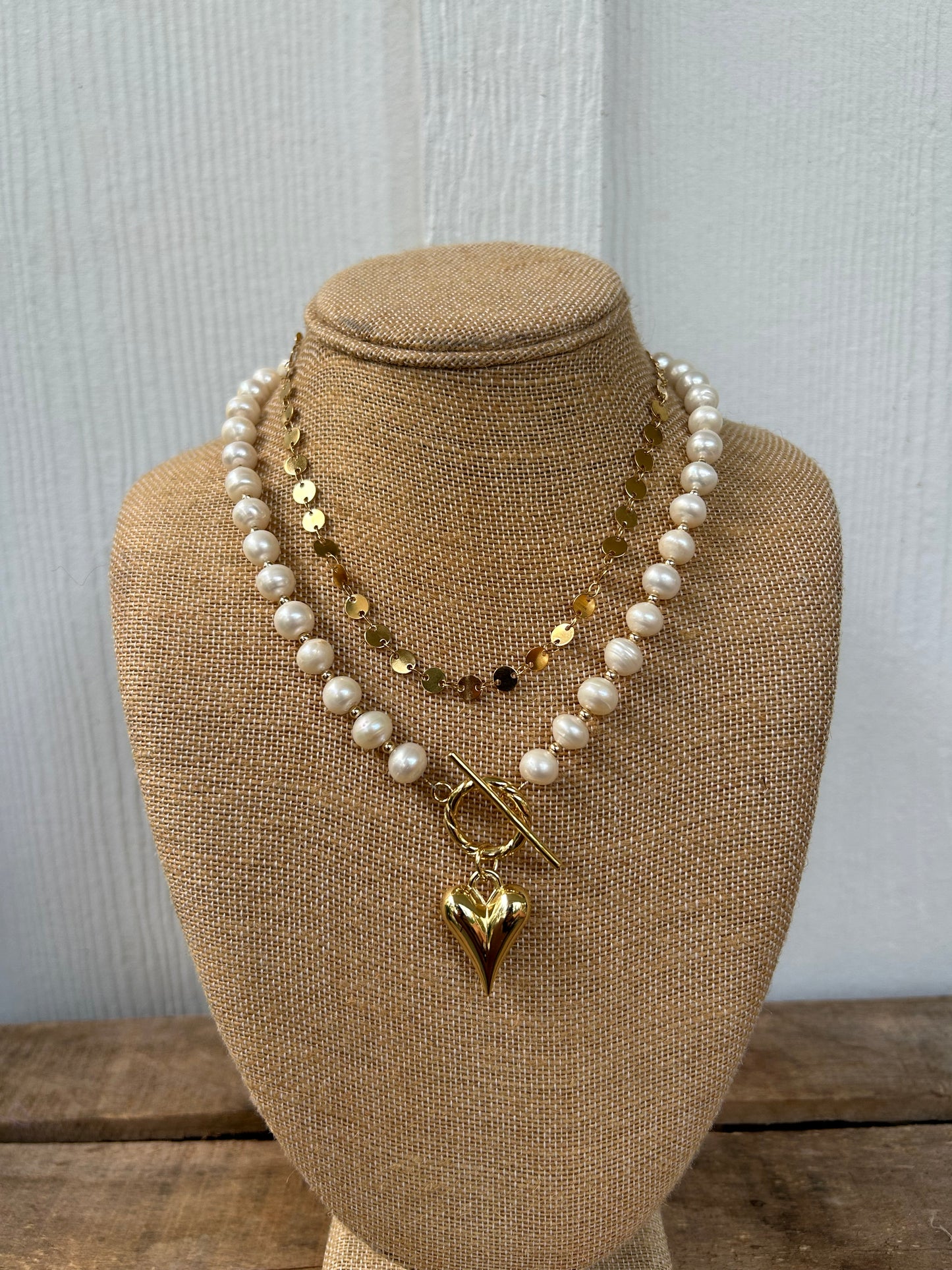 Gold pearls and heart
