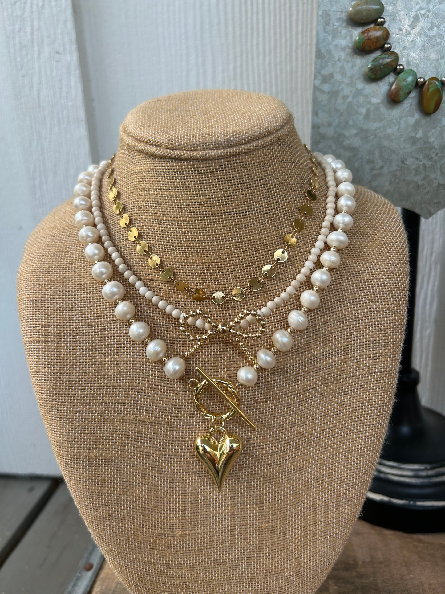 Cream and gold pearl bow