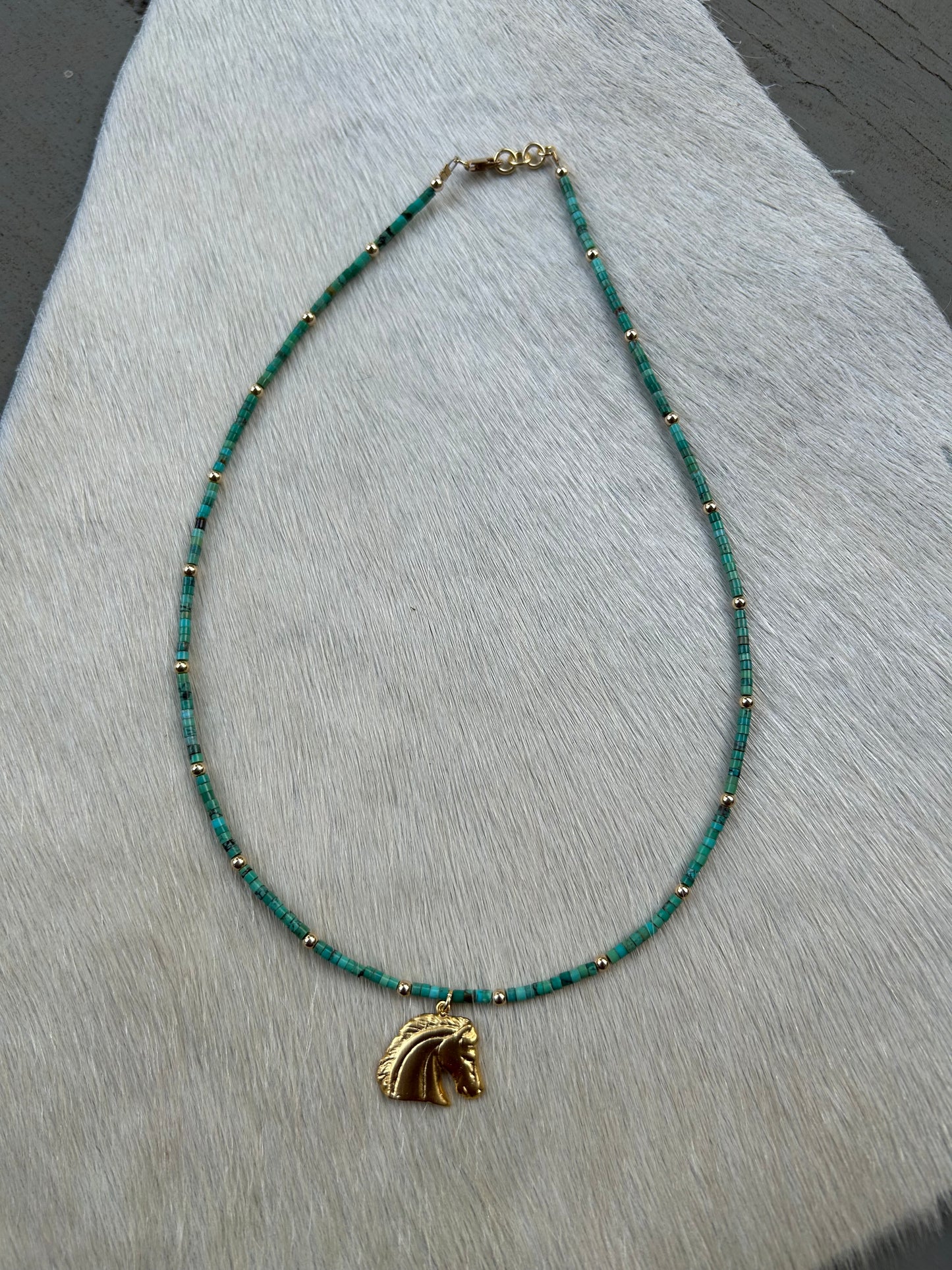 Gold horse charm