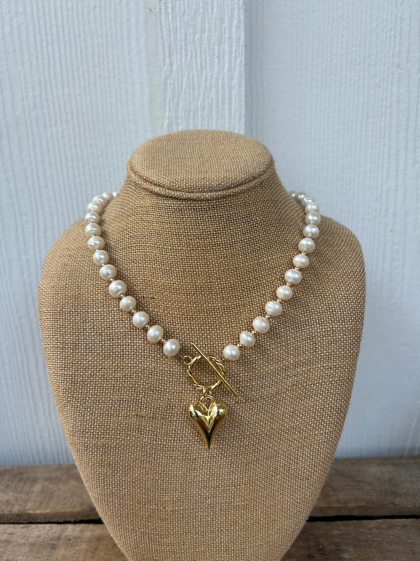 Gold pearls and heart