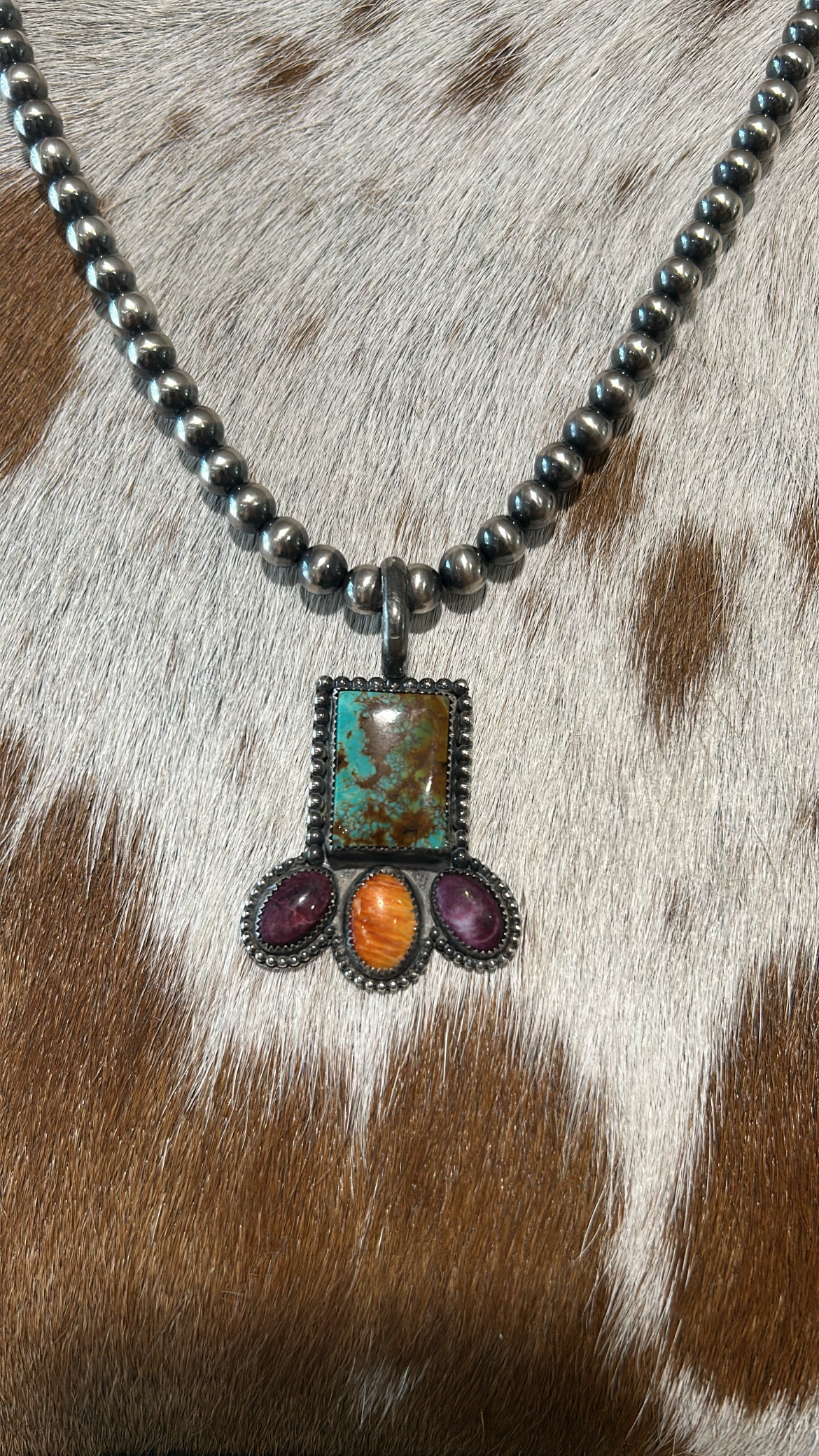 Turquoise and spiny pendant