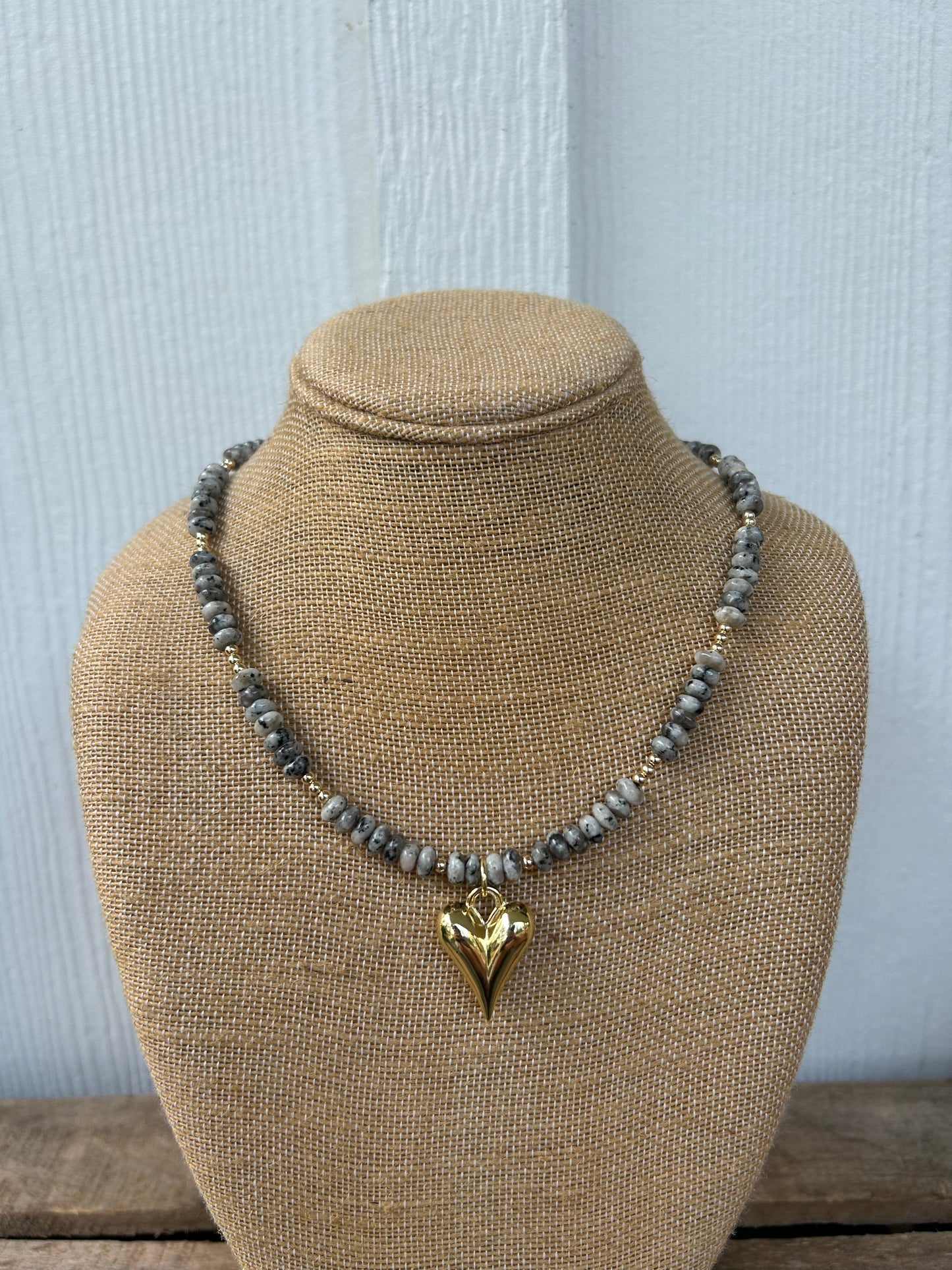 Gemstone and gold heart