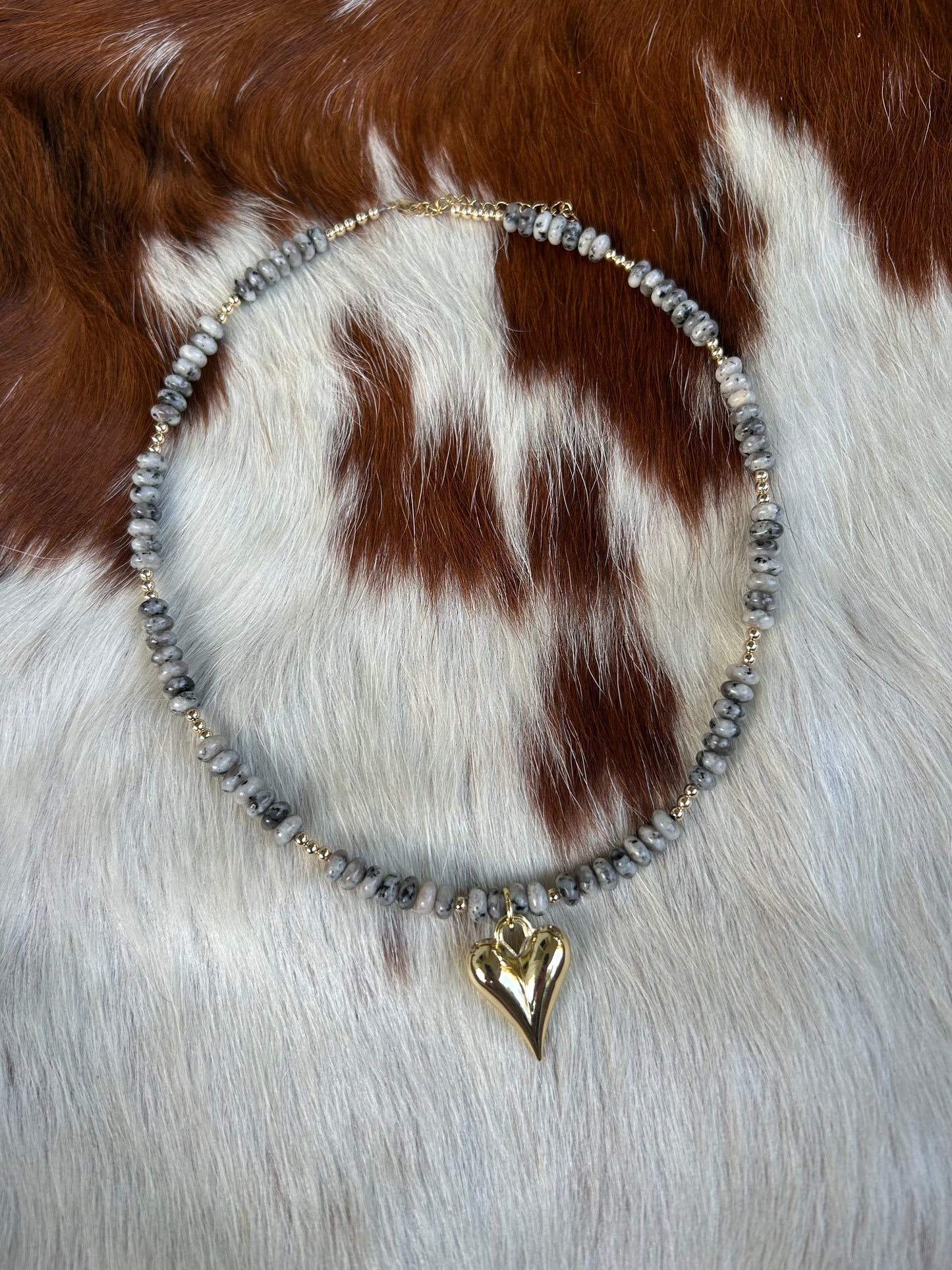 Gemstone and gold heart
