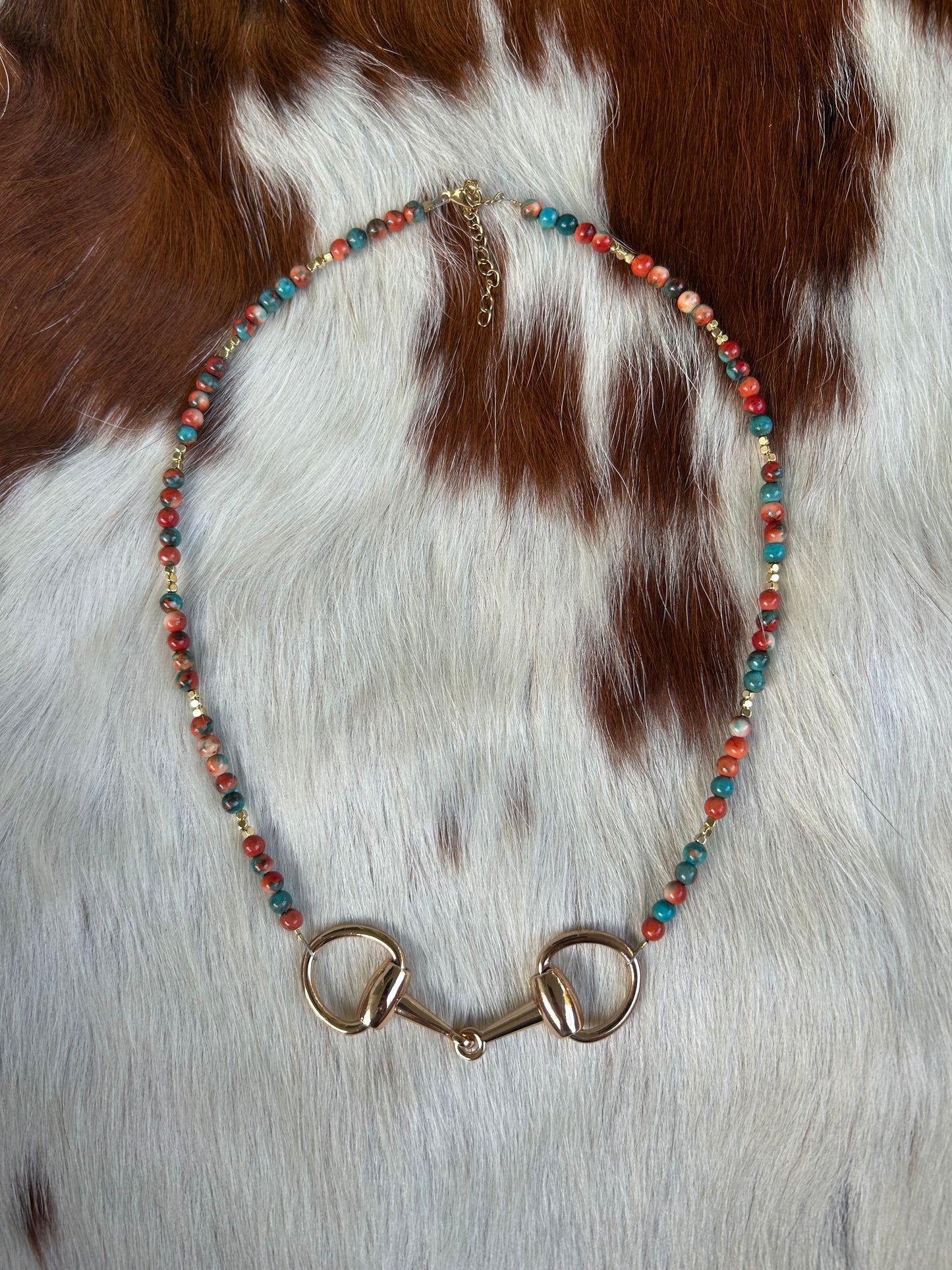 Gold bit necklace