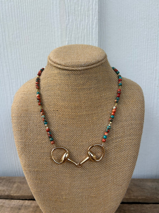 Gold bit necklace