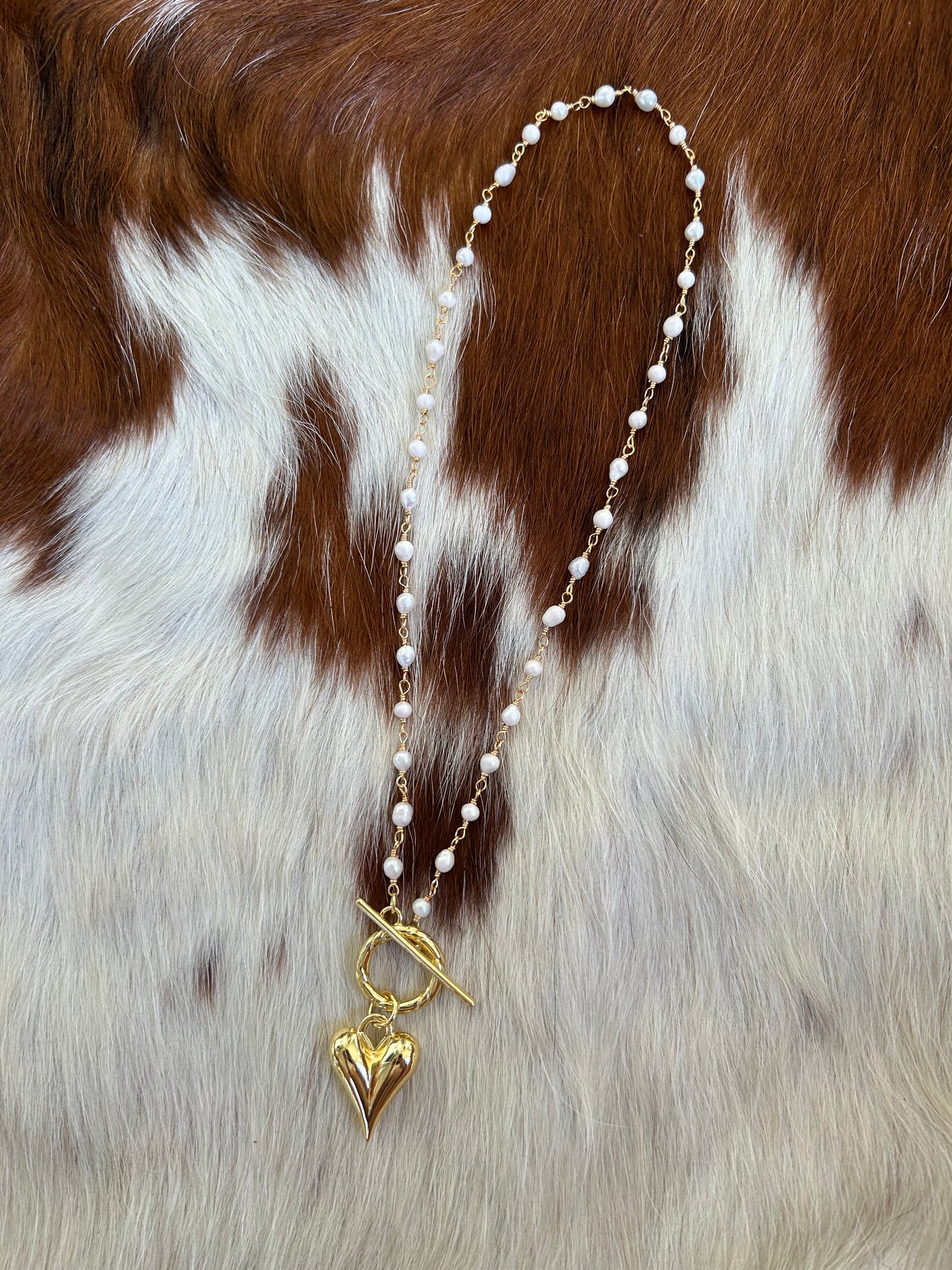 Pearl chain with gold heart
