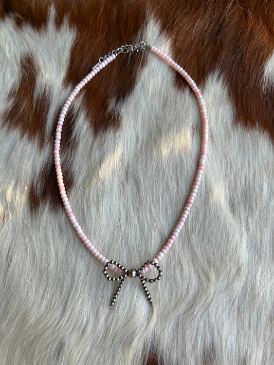Pink conch bow