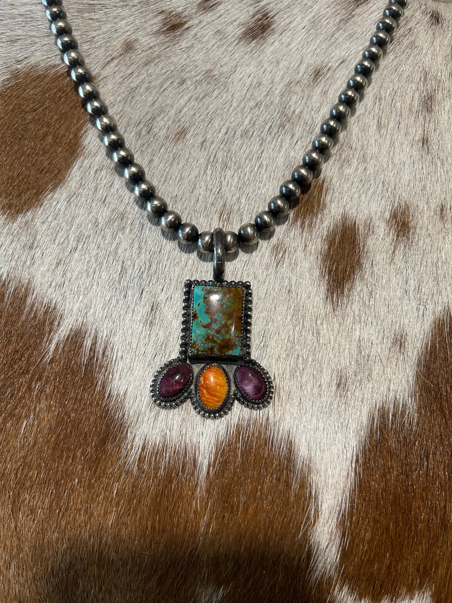 Turquoise and spiny pendant