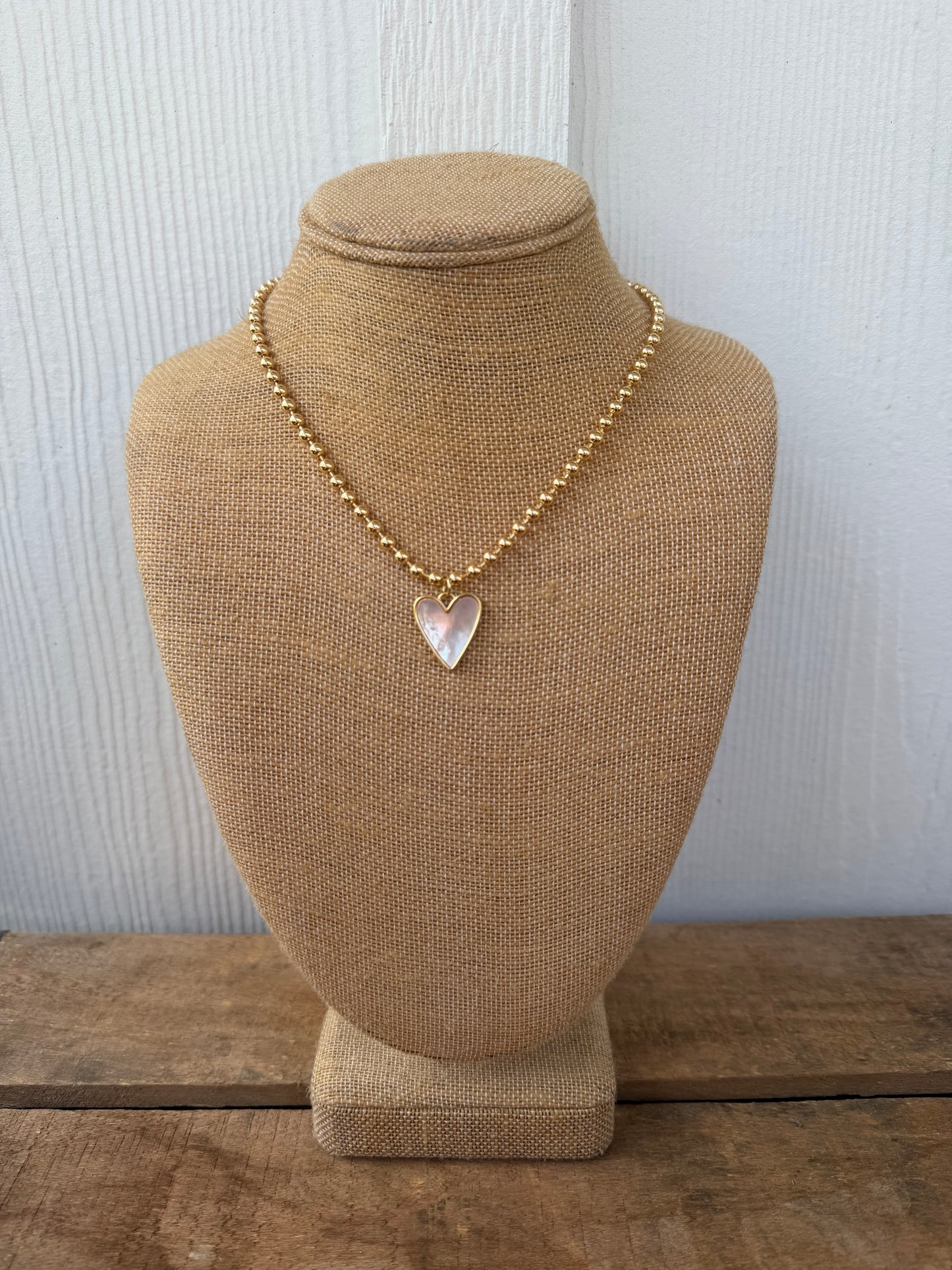 Gold ball chain with mother of pearl heart charm