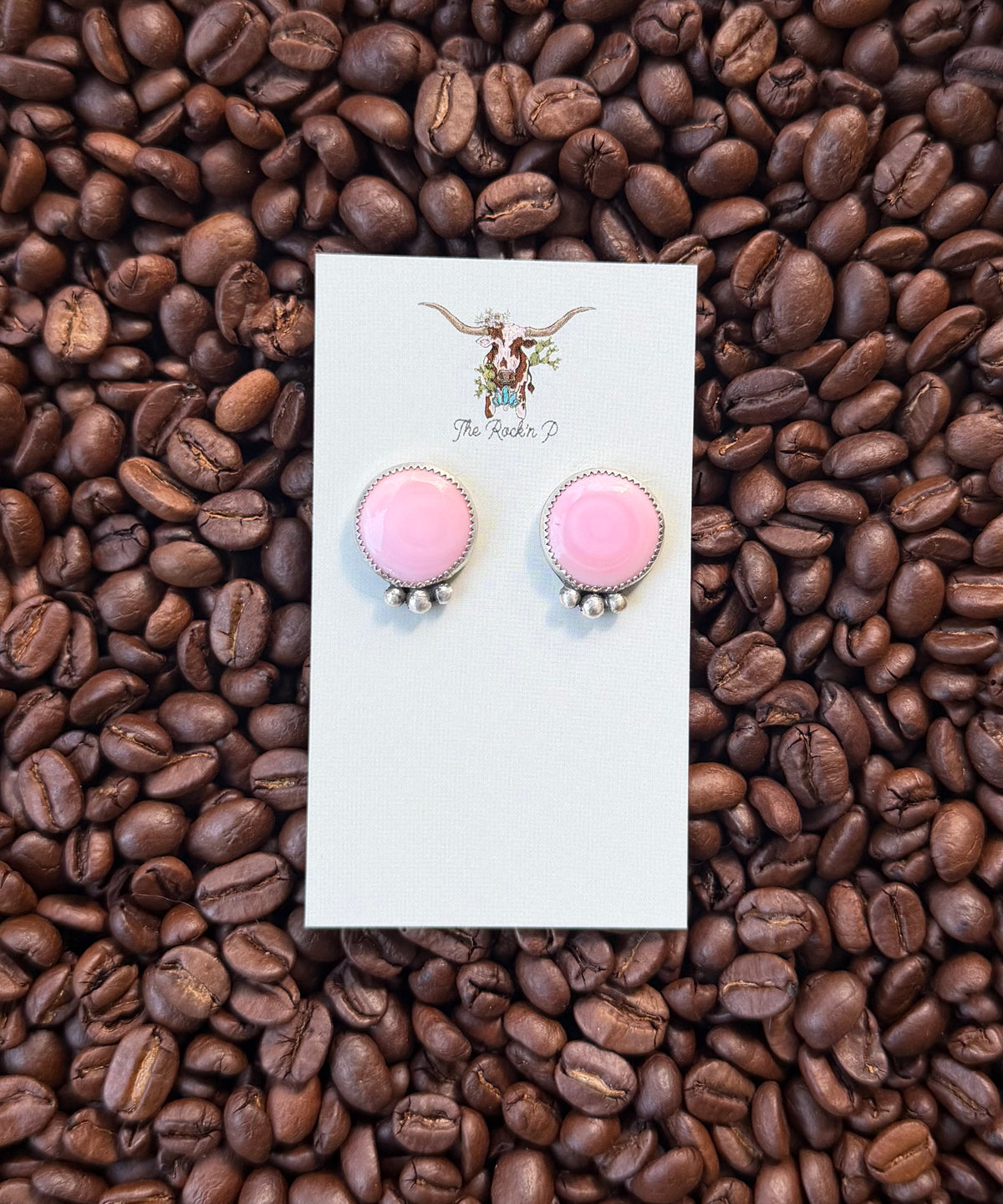 Pink conch studs