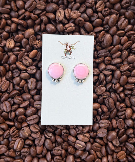 Pink conch studs