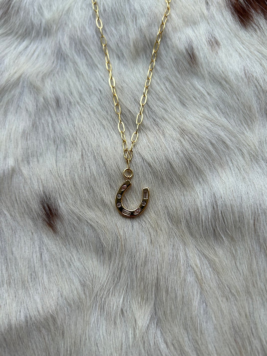 Gold horseshoe charm