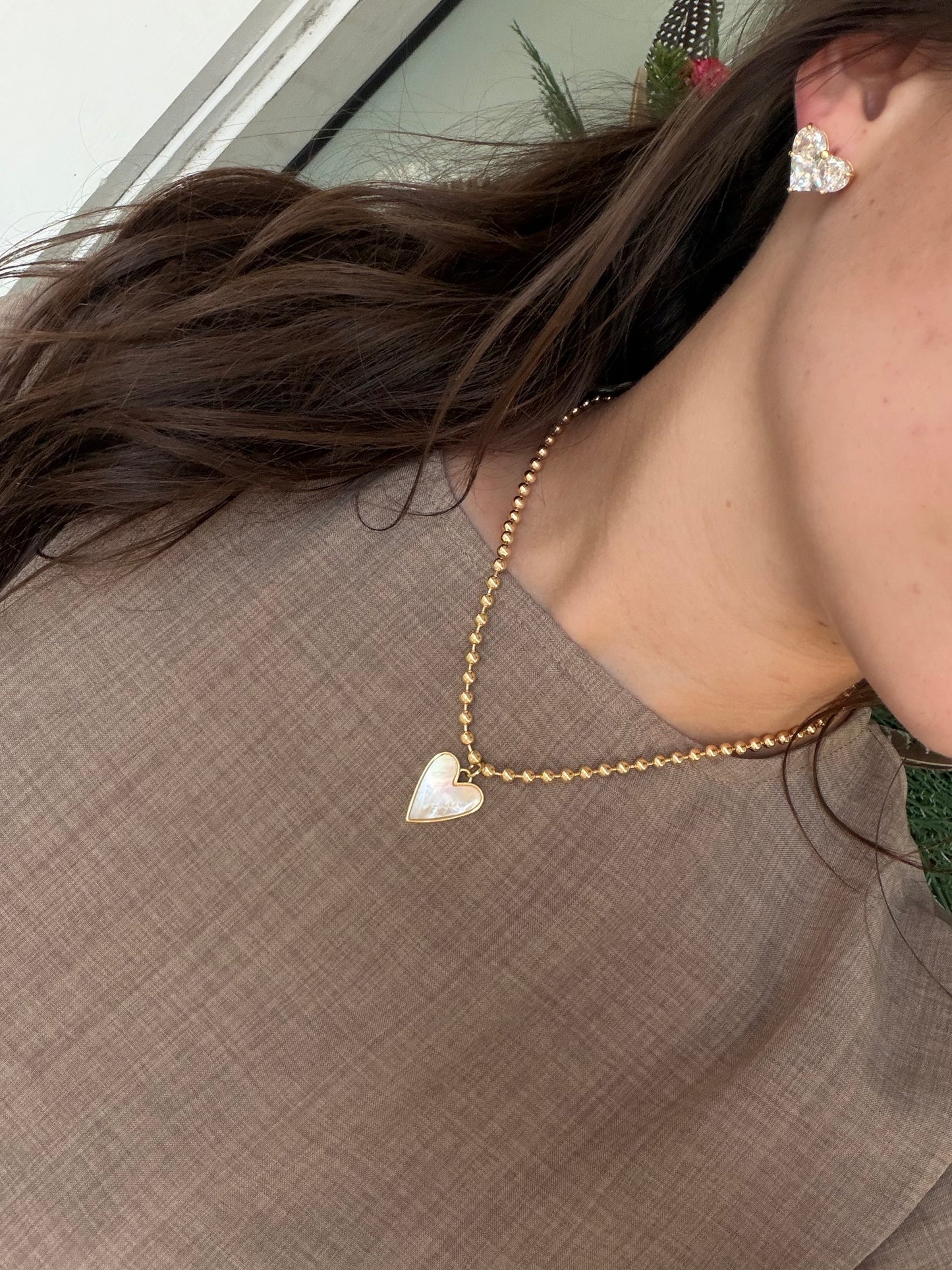 Gold ball chain with mother of pearl heart charm