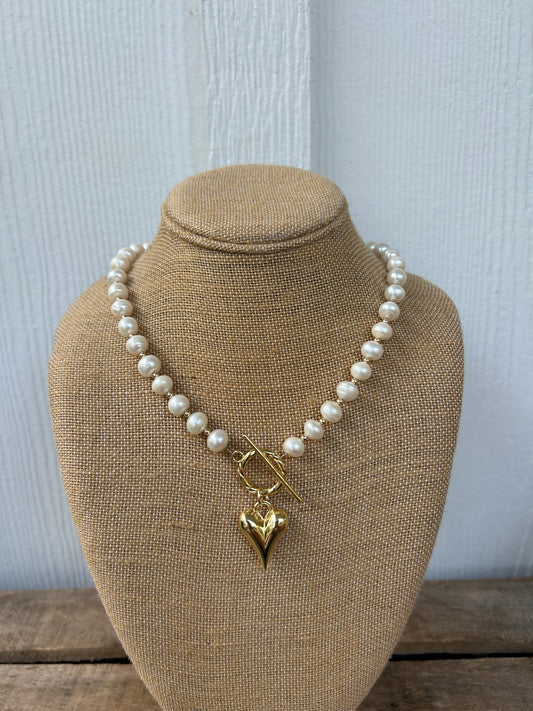 Gold pearls and heart