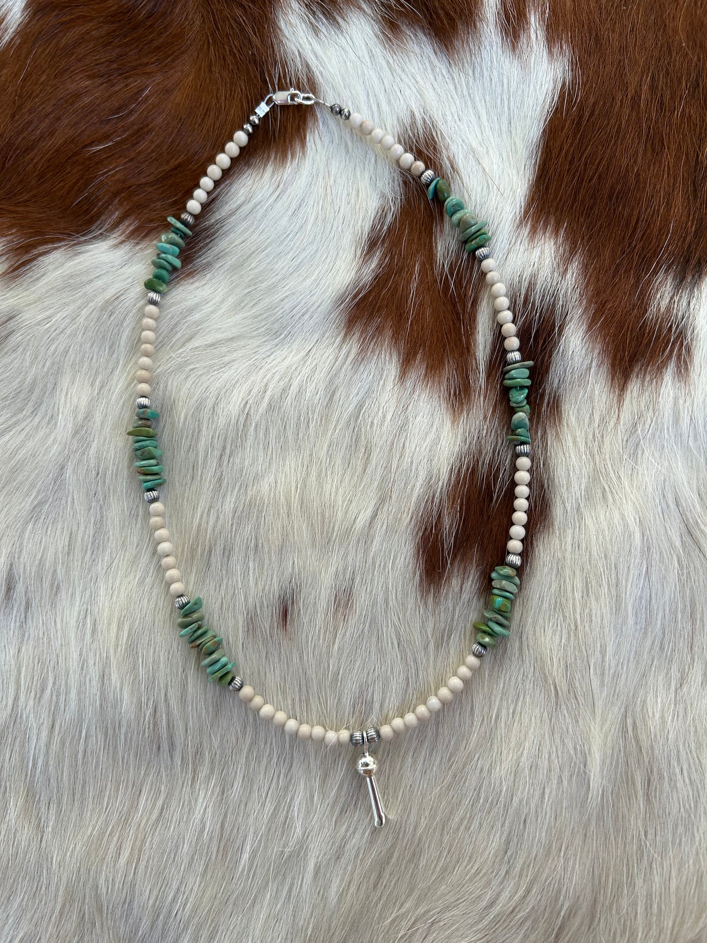 Riverstone and squash charm