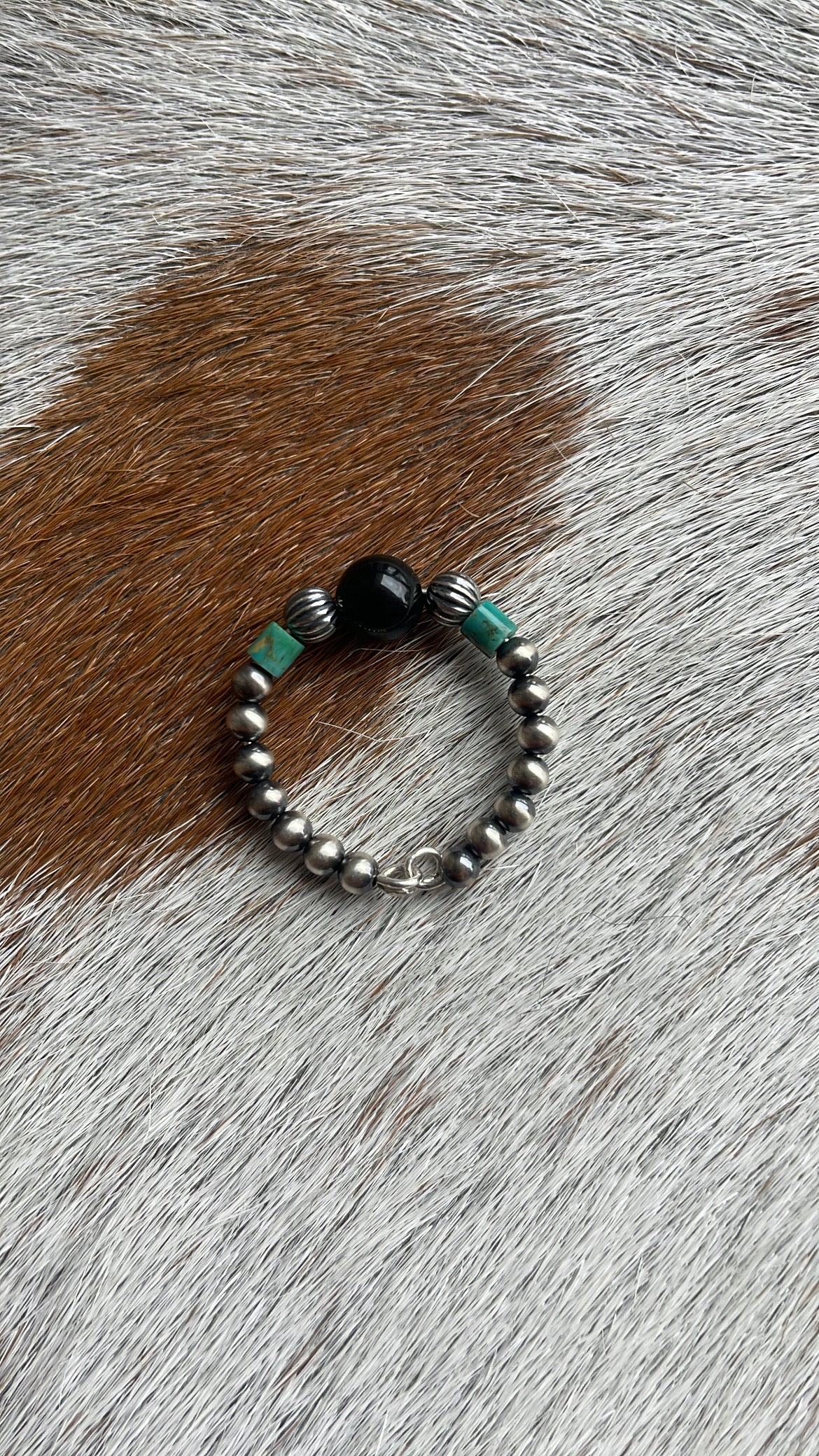 Turquoise and onyx ring