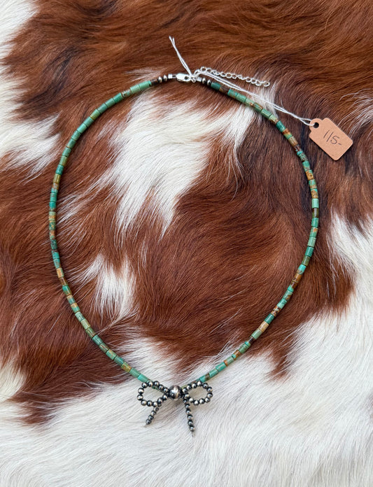 Turquoise and pearl bow