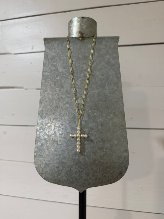 Gold pearl cross necklace