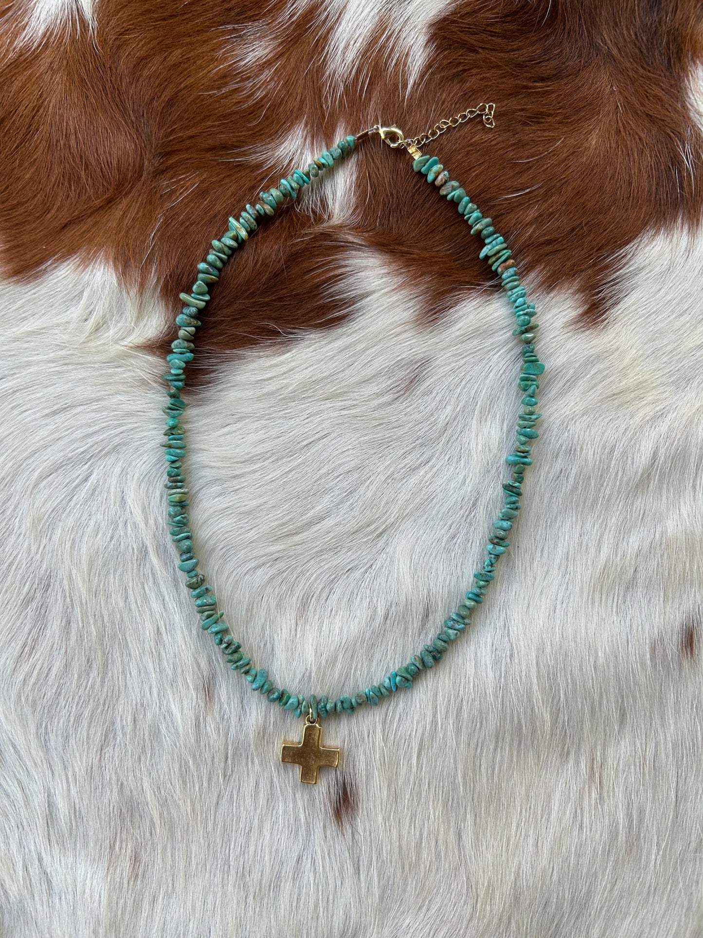 Turquoise and gold cross