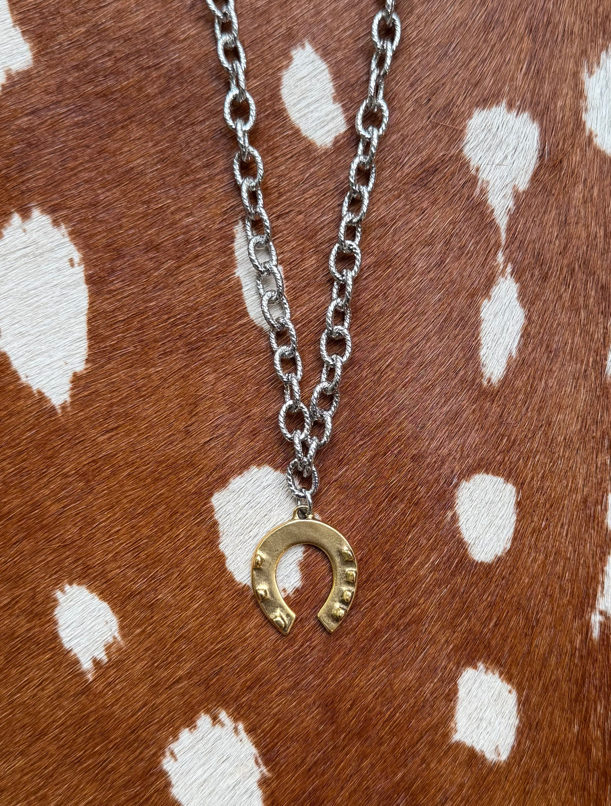 Mixed metal horseshoe necklace